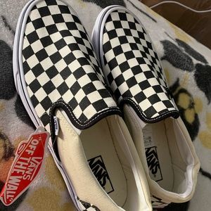 Never worn Vans checkered slip ons